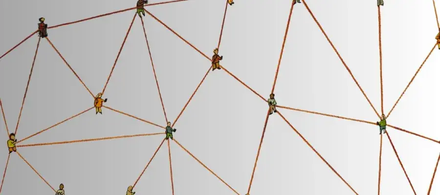 Several small cartoon representations of people are linked by brown handdrawn lines representing a network.